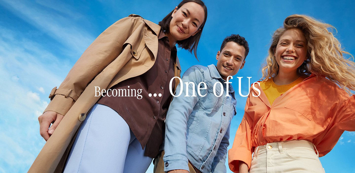 Three team members with overlay text: "Becoming...One of Us"